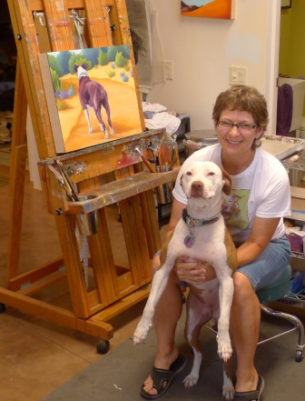 Martha Jennedy has found meaning and heart in painting dogs, which began as a break from her regular artwork She is wearing a T-shirt she designed for NMDog.